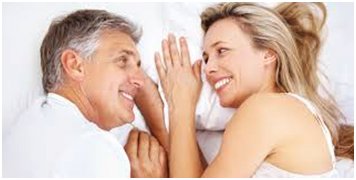 happy couple in bed after sex